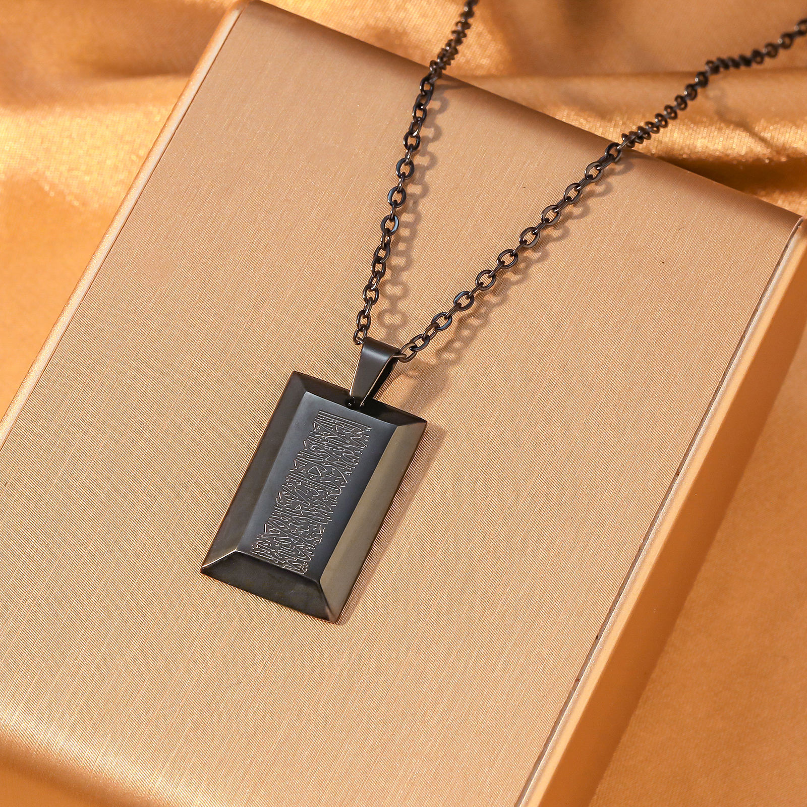 Midnight Black Ayatul Kursi Tablet Pendant - Unique matte black finish religious jewelry with sharp laser-etched script

