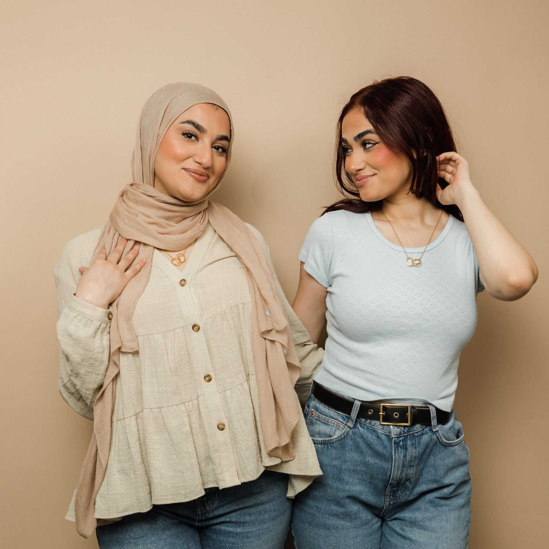 Ayatul Kursi Interlocking Ring Necklace - Model Lifestyle Shot Gold and Silver Variants | CIGAONI

