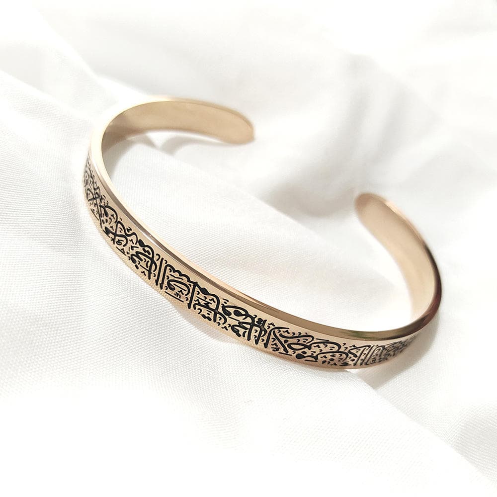 CIGAONI rose gold Ayatul Kursi open cuff bangle with black Arabic calligraphy engraving on white silk fabric