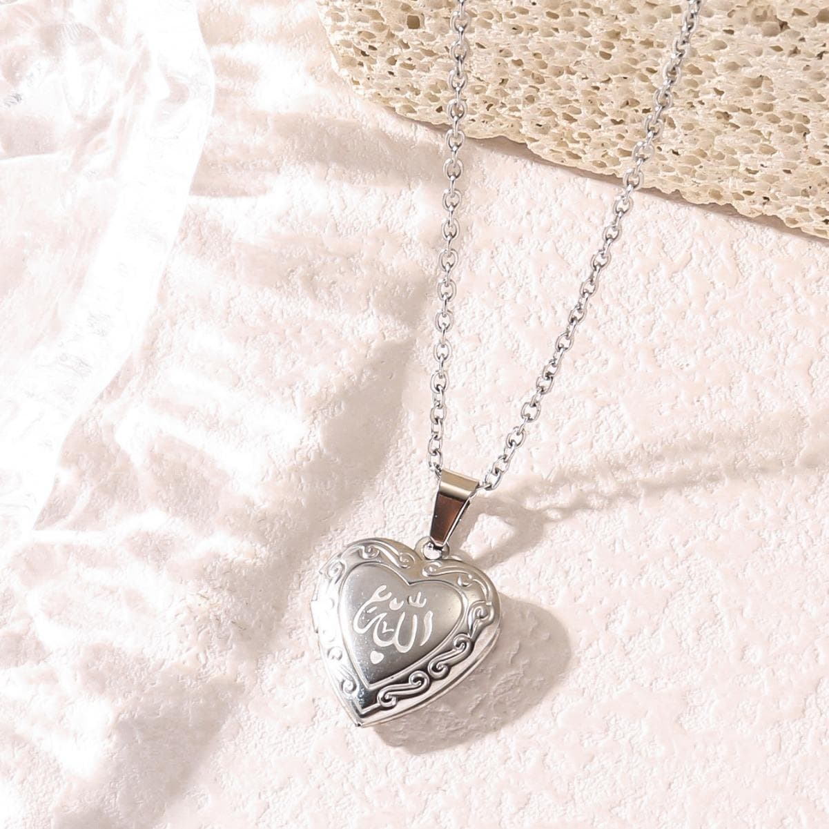 CIGAONI silver heart locket necklace with Allah Arabic calligraphy on white fabric - faith-inspired keepsake jewelry