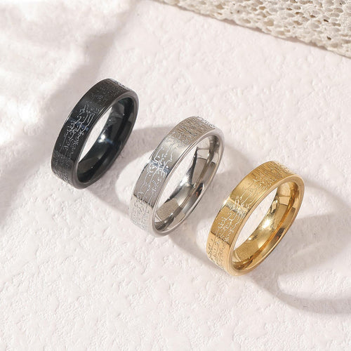 CIGAONI Eternal Verse Arabic calligraphy stackable band rings flat lay – three finishes side by side: matte black, polished silver, and 18K gold on white background

