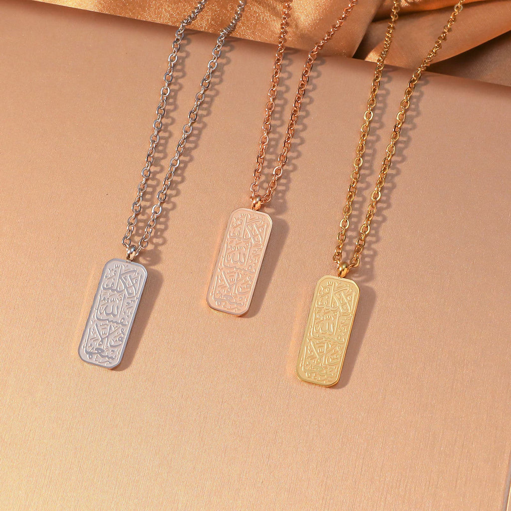 CIGAONI Allah Arabic Calligraphy Rectangular Plaque Necklace in three finishes - Silver, Rose Gold and 18K Gold - displayed side by side on beige background