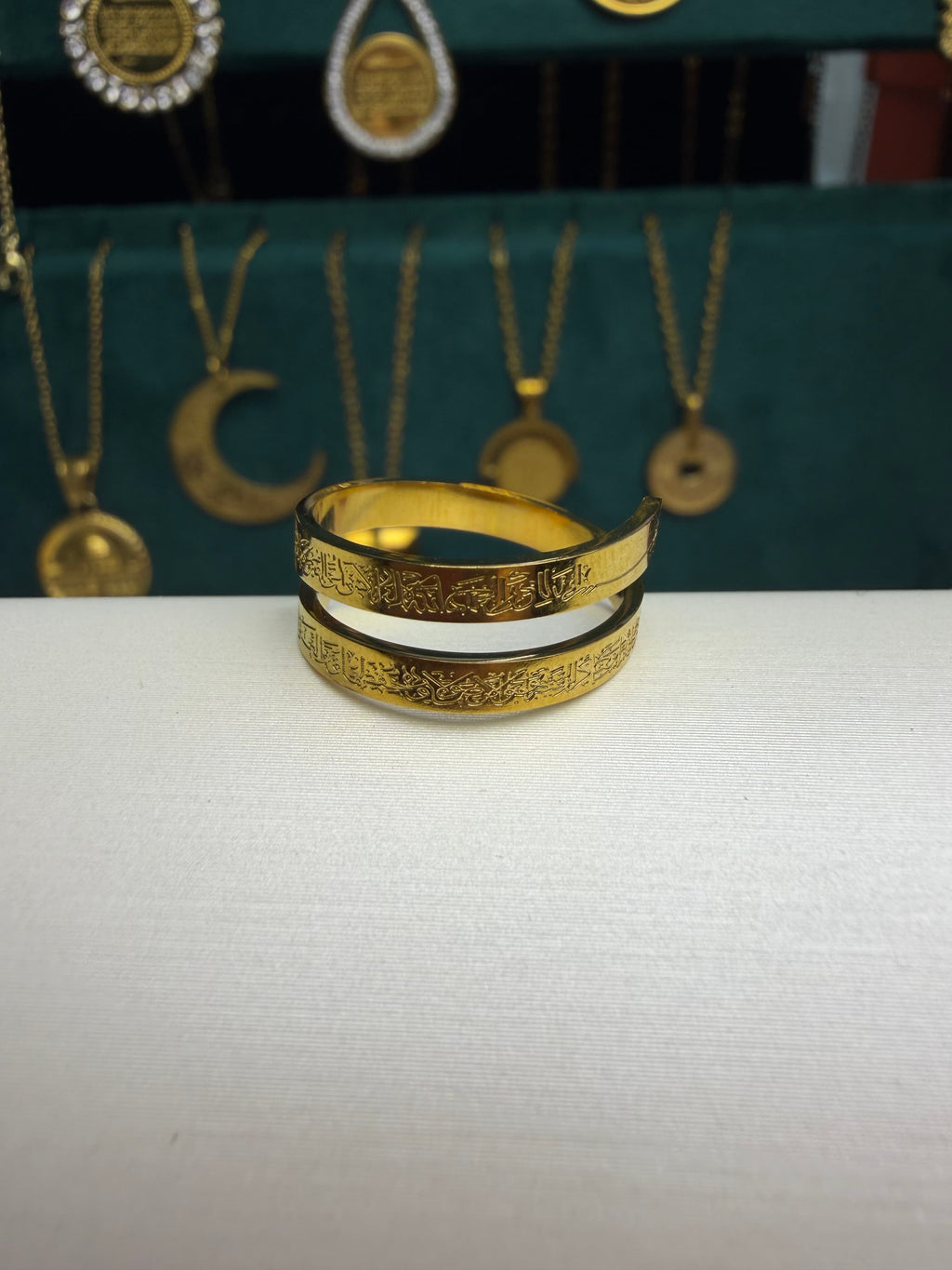 CIGAONI Ayatul Kursi 18K gold plated bangle bracelet side view on white stand
