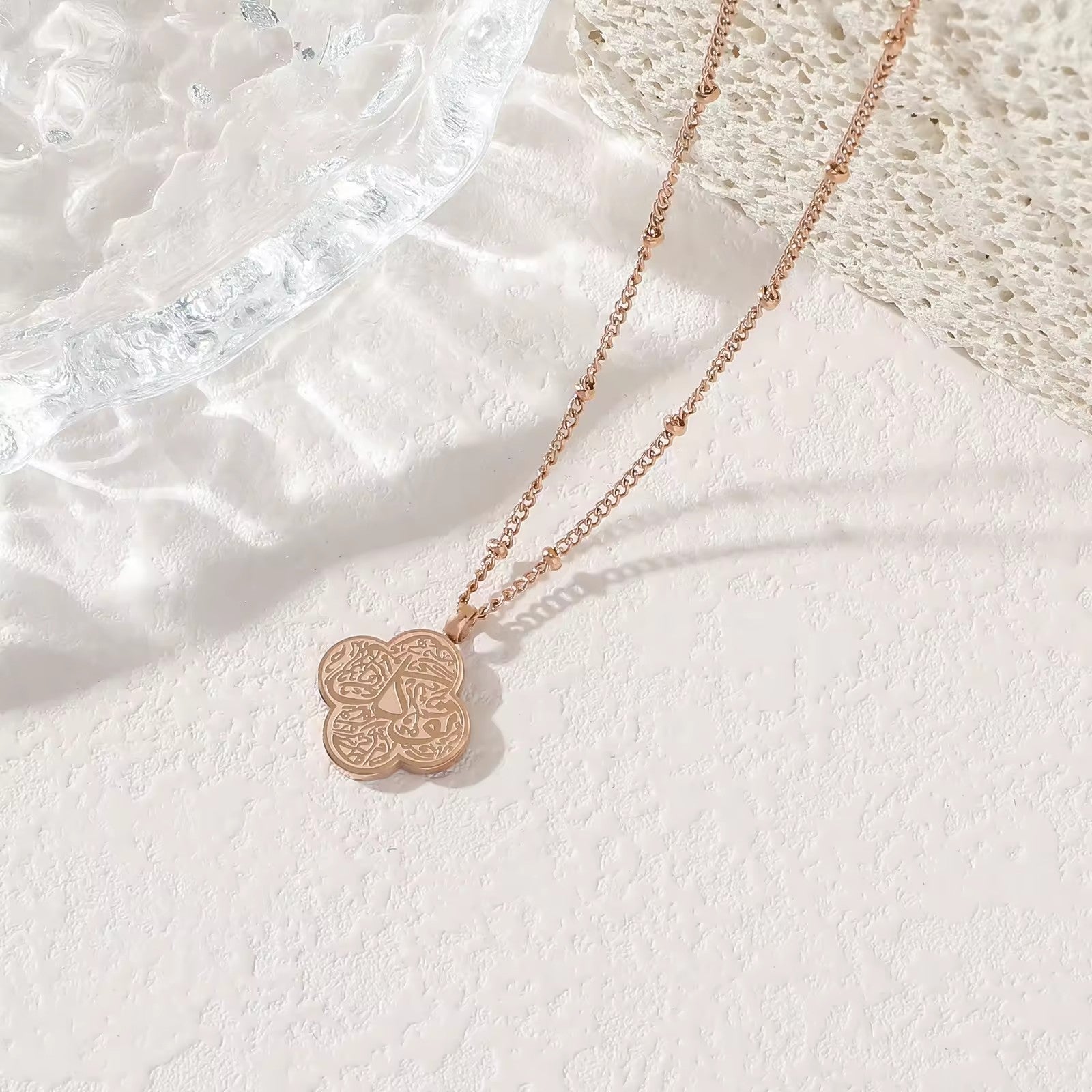 CIGAONI silver clover necklace close-up detail shot