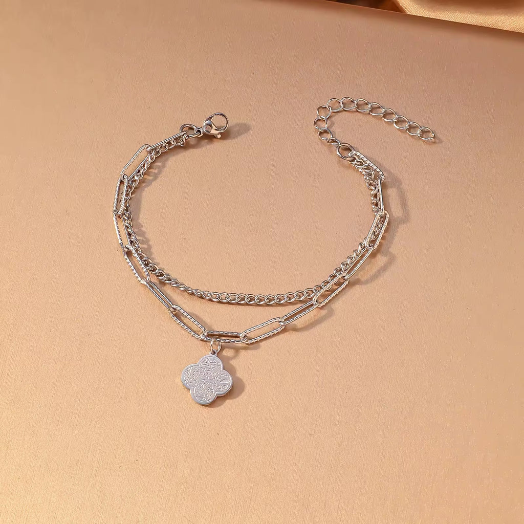 Detail shot of CIGAONI layered chain bracelet - Premium 316L stainless steel jewelry with sacred Arabic engravings