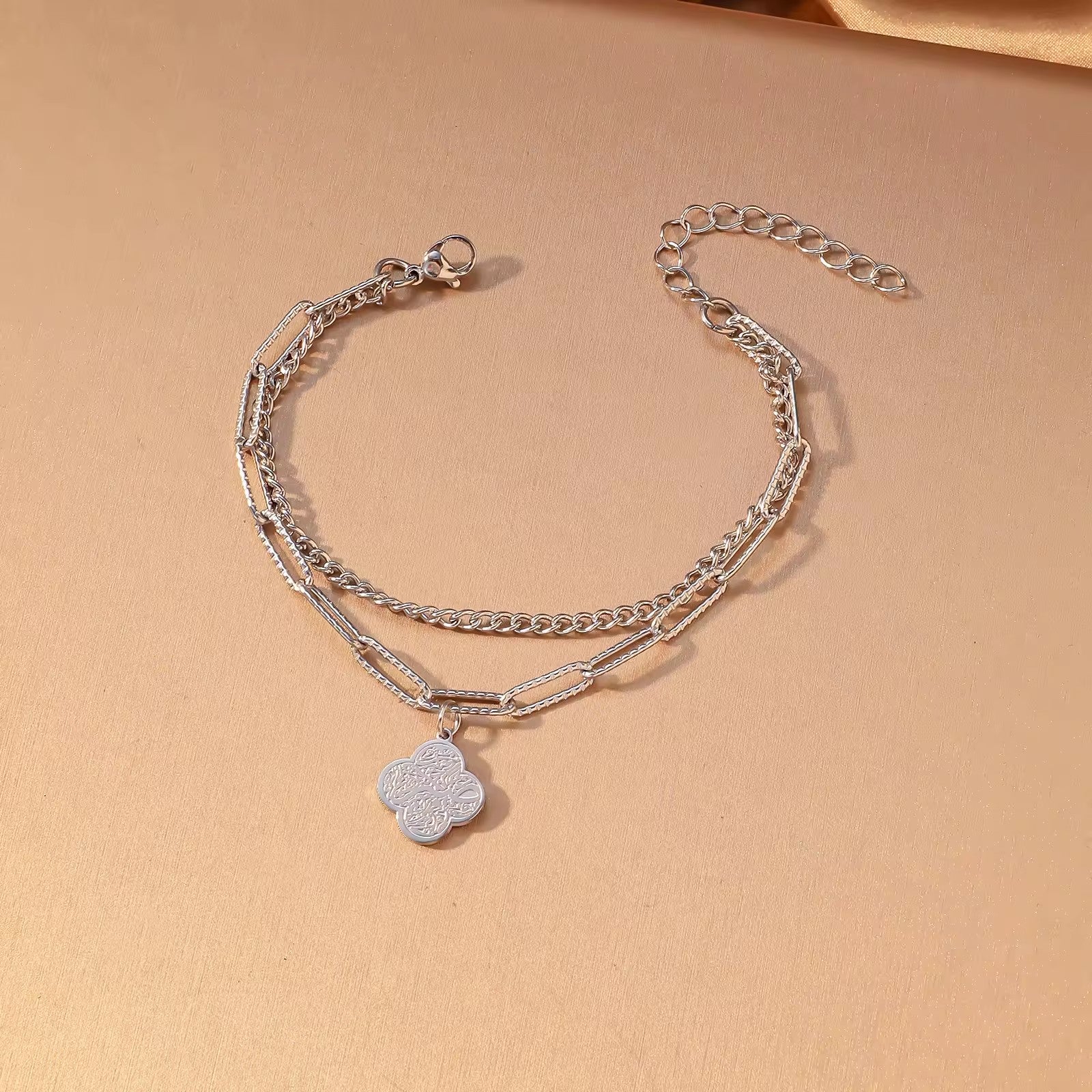 Detail shot of CIGAONI layered chain bracelet - Premium 316L stainless steel jewelry with sacred Arabic engravings