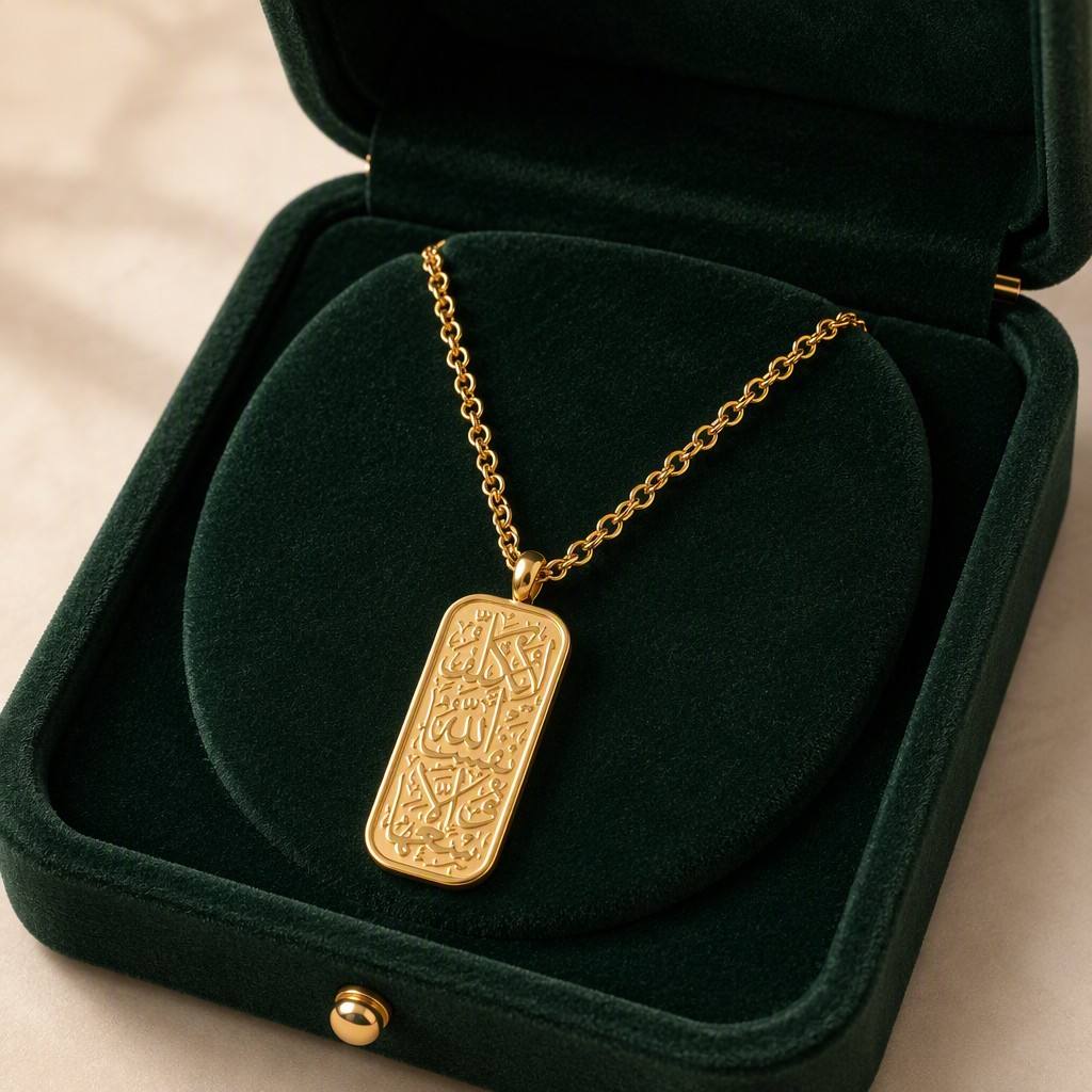 CIGAONI 18K Gold Allah Arabic Calligraphy Plaque Necklace displayed in open emerald green luxury jewelry gift box