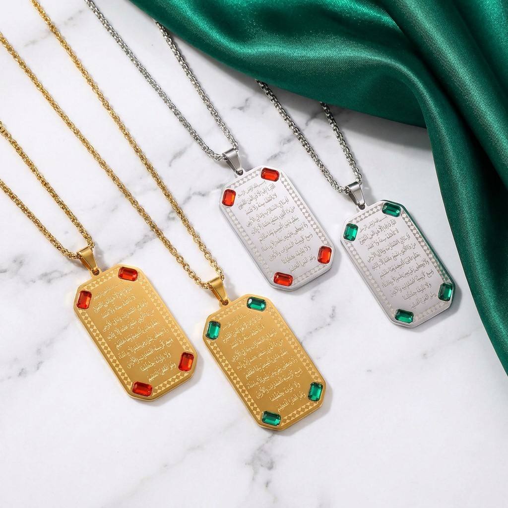 CIGAONI Ayatul Kursi necklace collection – gold and silver plaque pendants with red and green gemstone corners on marble background