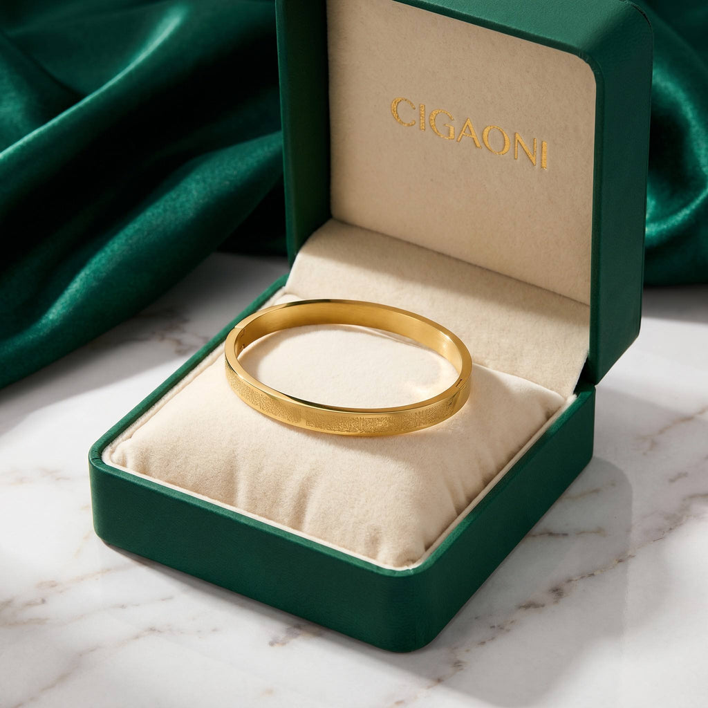 Luxury emerald green CIGAONI gift box with gold Ayatul Kursi bangle for premium unboxing
