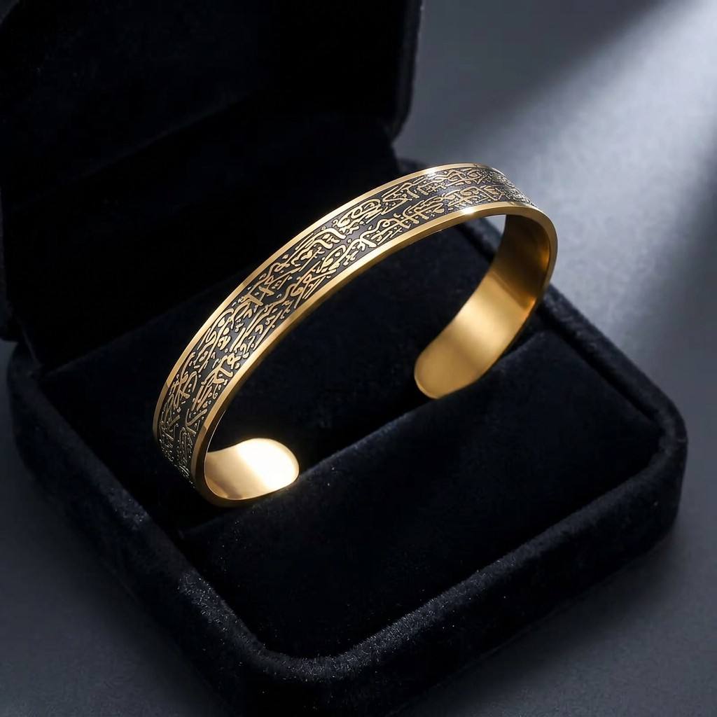 CIGAONI Sovereign Shield 18K gold Ayatul Kursi open cuff bangle displayed in black velvet luxury gift box