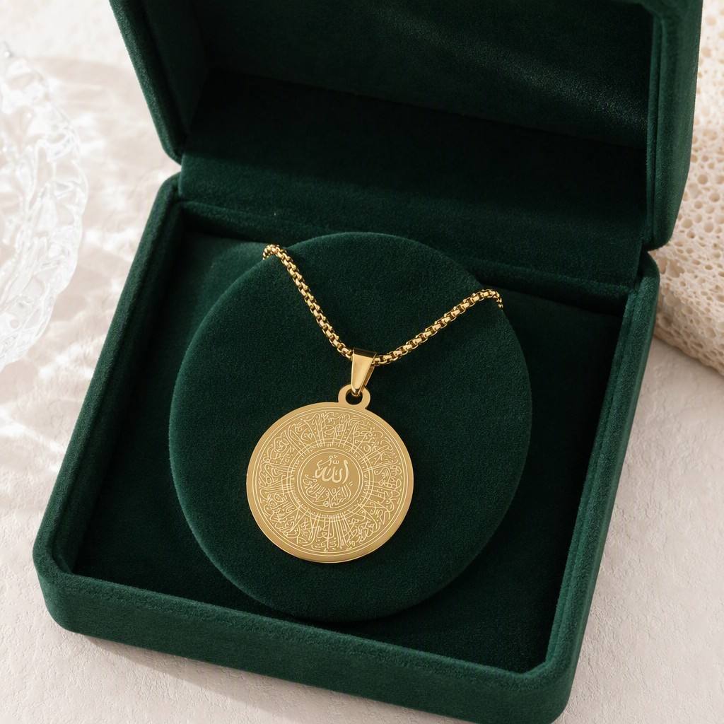 CIGAONI 18K Gold Allah Concentric Calligraphy Medallion Necklace displayed in open emerald green luxury jewelry gift box on white lace background