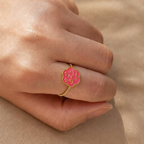 Model wearing CIGAONI Bloom of Salam teal enamel Arabic calligraphy ring on finger – lifestyle close-up showing adjustable fit

