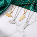 CIGAONI Sacred Soil Necklace - Gold Palestine and Iraq Map Arabic Calligraphy Pendants on Marble Display