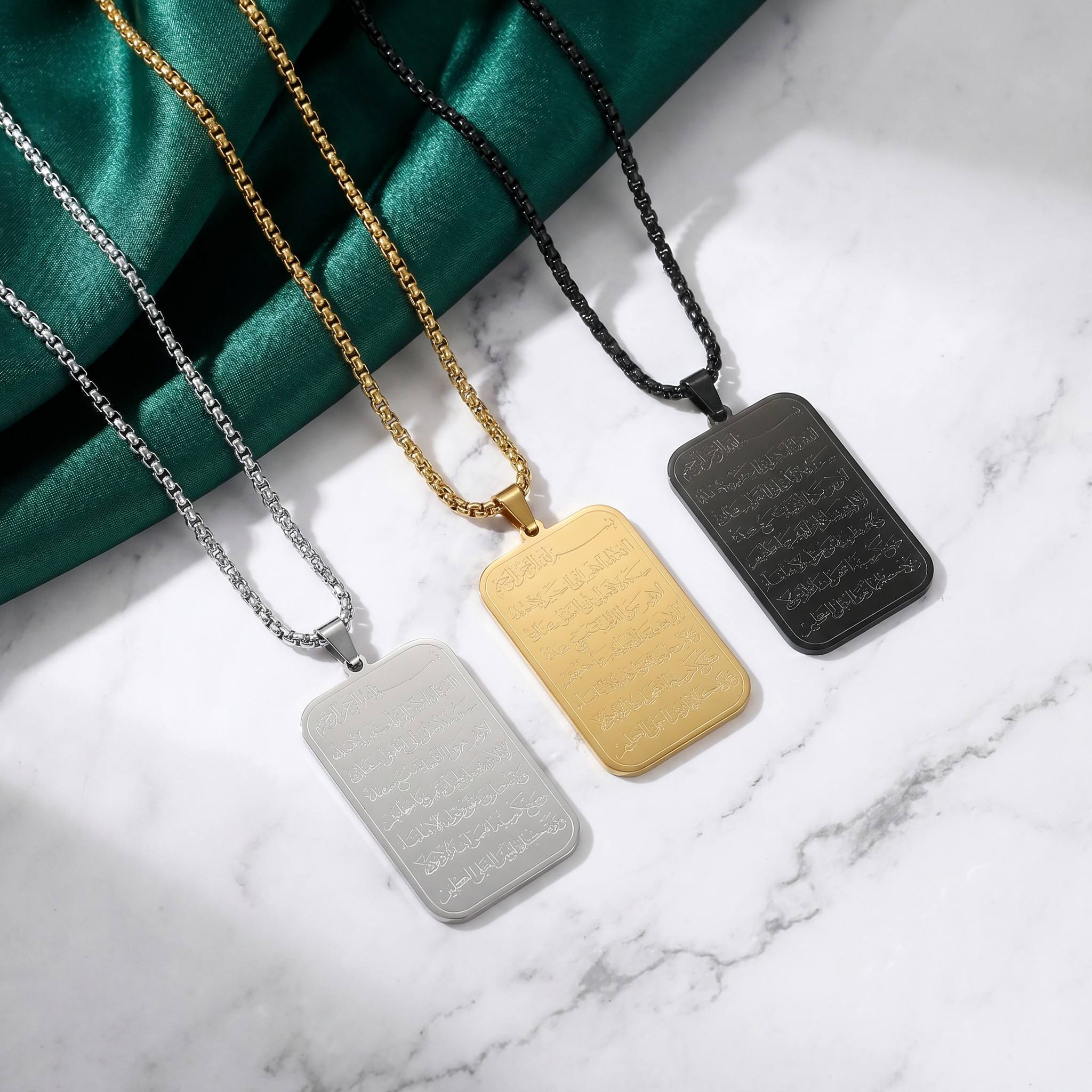 CIGAONI Sacred Tablet Ayatul Kursi plaque necklace in silver, gold and matte black on marble with green silk backdrop