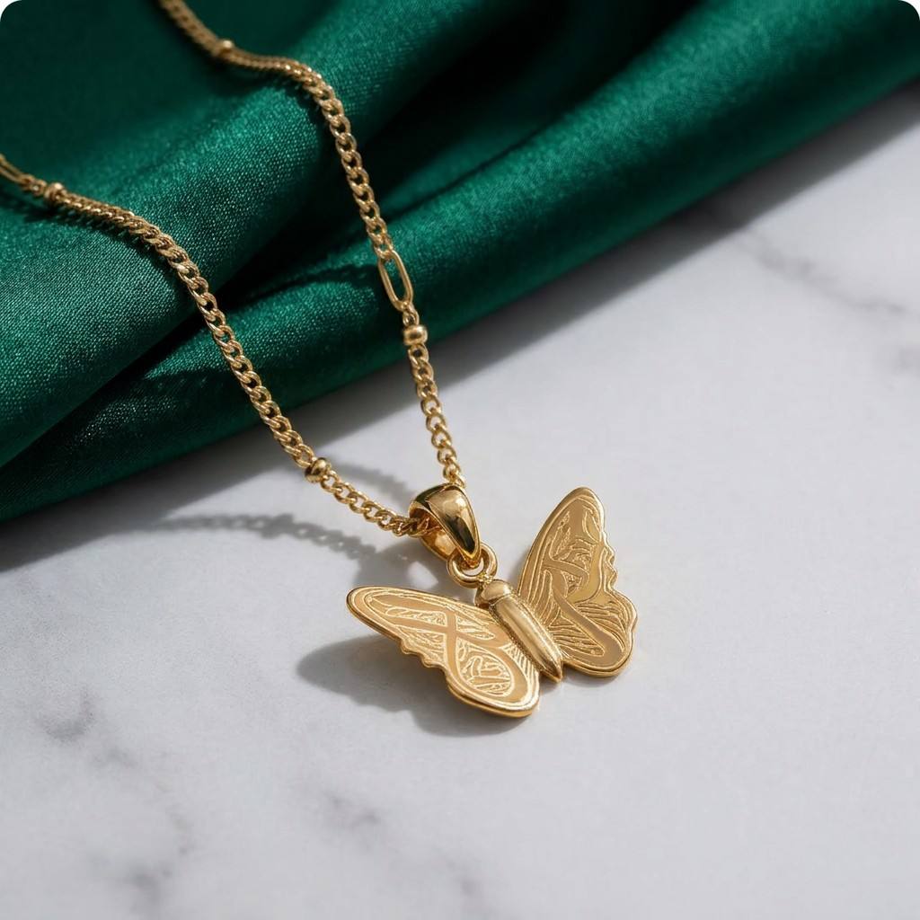 Model wearing gold butterfly necklace with green silk background - CIGAONI
