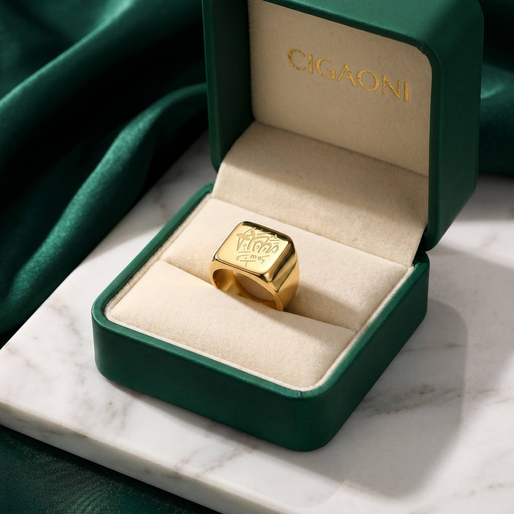 Luxury emerald green CIGAONI gift box with gold Allah signet ring for a premium spiritual gift
