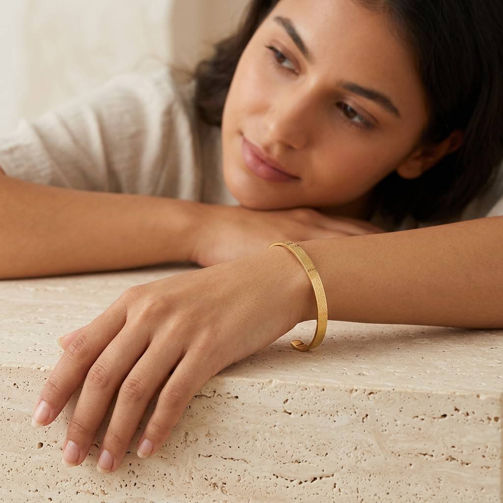 CIGAONI Pure Sanctuary Ayatul Kursi 18K gold open cuff bangle worn on woman's wrist, minimalist faith jewelry

