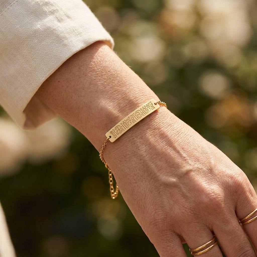 CIGAONI 18K gold Ayatul Kursi bar bracelet worn on wrist, slim minimalist design with delicate chain
