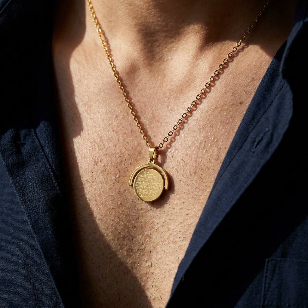 Professional male model wearing CIGAONI gold Ayatul Kursi spinner pendant - Masculine and understated religious protection necklace

