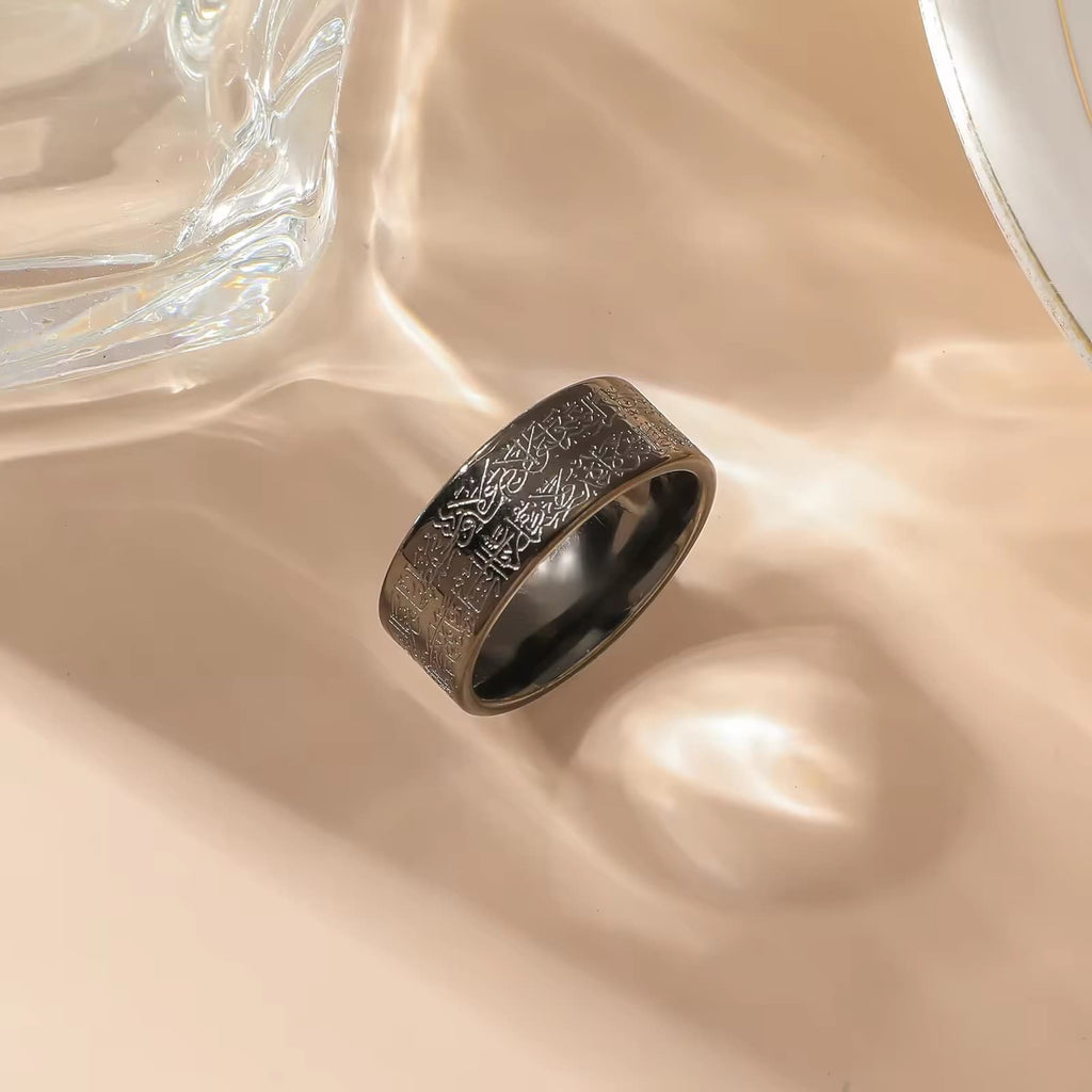 CIGAONI Ayatul Kursi Ring in Matte Black — wide band stainless steel ring with engraved Arabic calligraphy on silk background