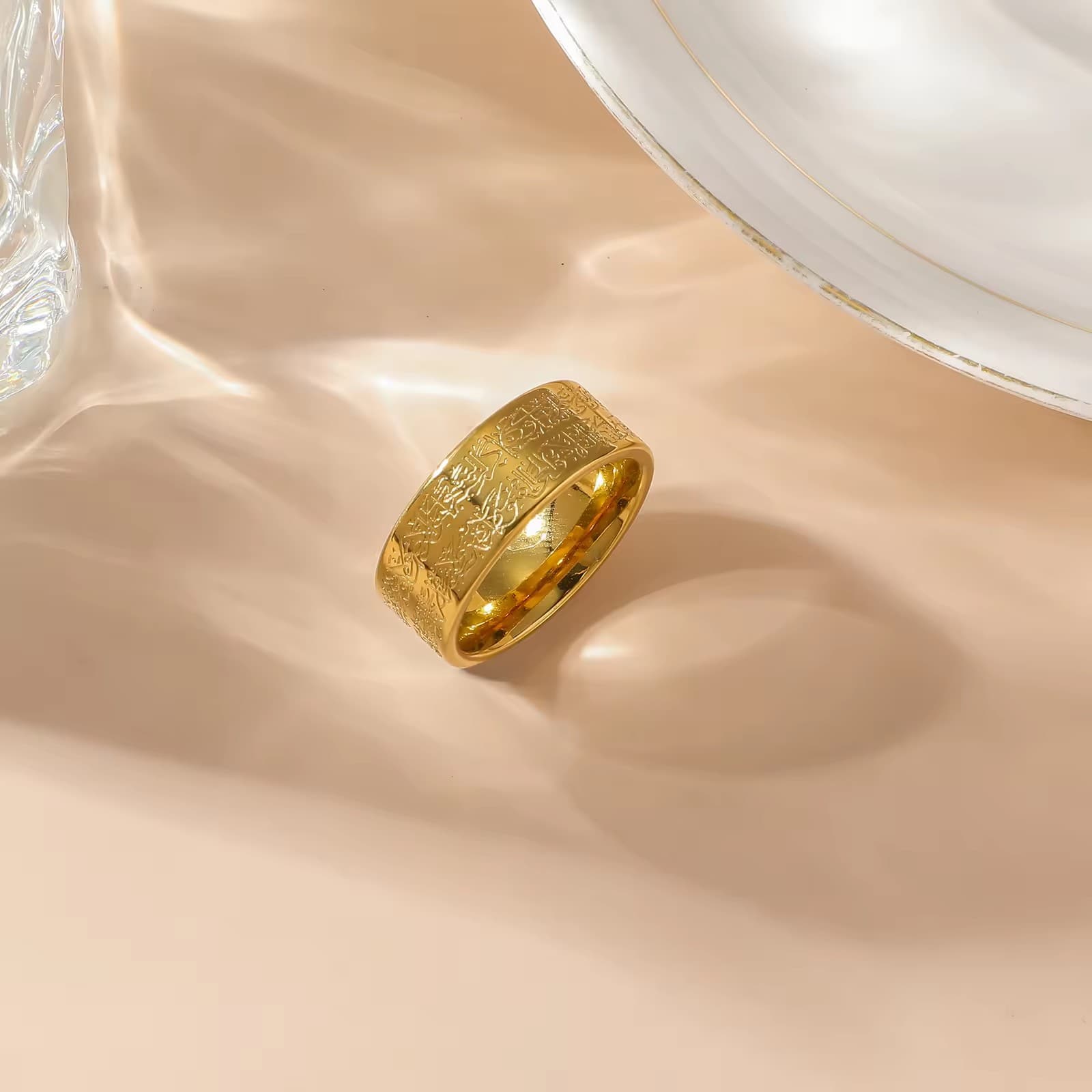 CIGAONI Ayatul Kursi Ring in Gold Tone — wide band stainless steel ring with engraved Arabic calligraphy on silk background