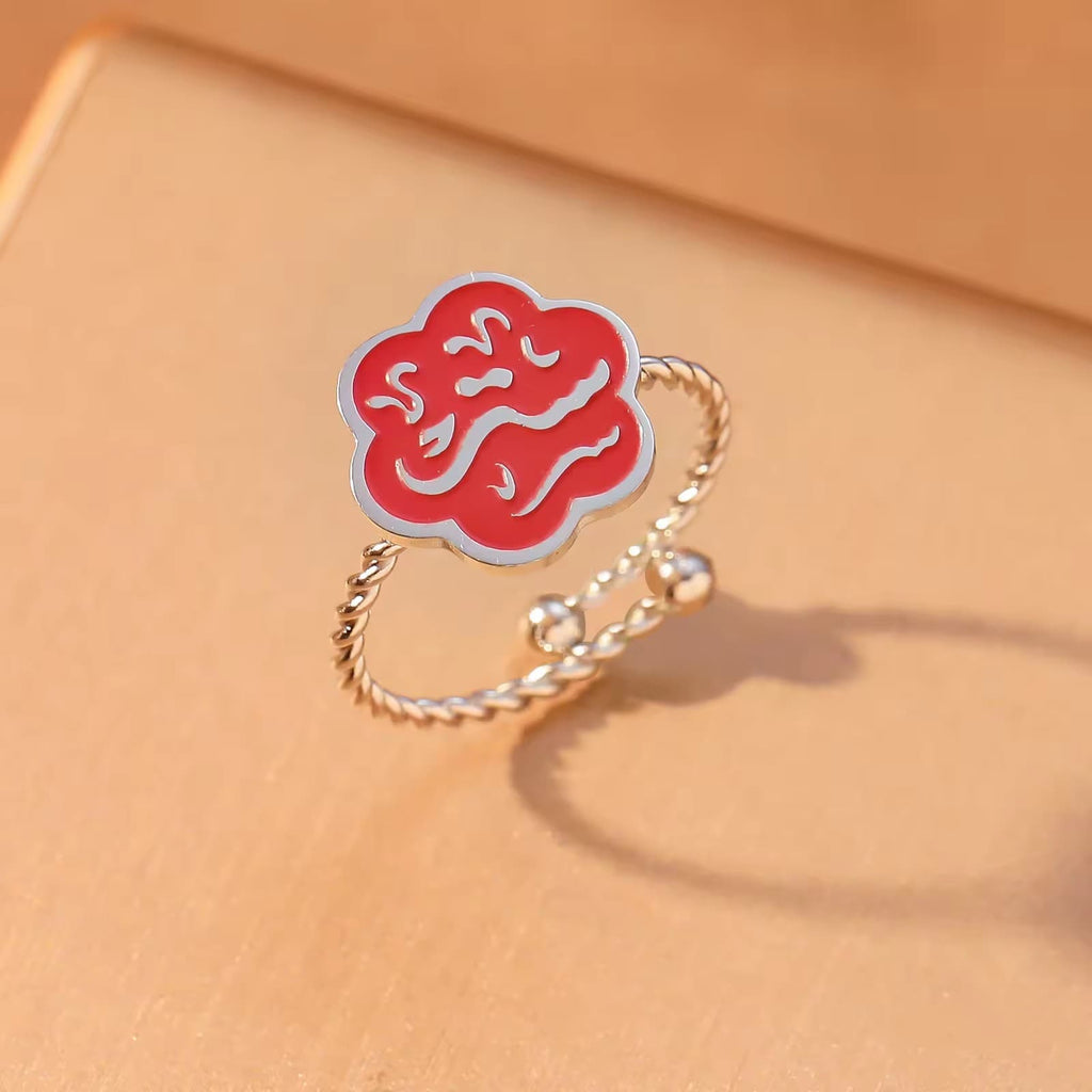 CIGAONI Bloom of Salam ruby red enamel ring in 18K gold – side angle showing twisted rope adjustable band design


