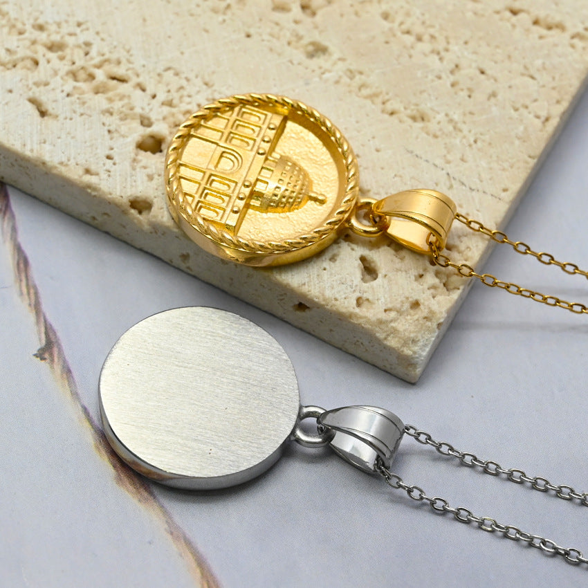 Flat lay of gold coin pendant on white background, faith jewelry detail