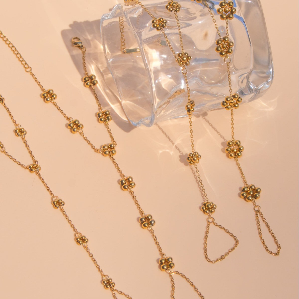 Dainty Flower Hand Harness Collection - 18K Gold Plated Slave Bracelets with Multiple Floral Link Designs by Cigaoni

