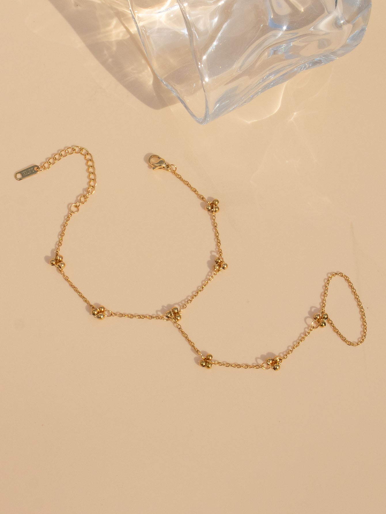 Four flower link minimalist hand chain - Refined 18K gold plated jewelry for daily modest fashion

