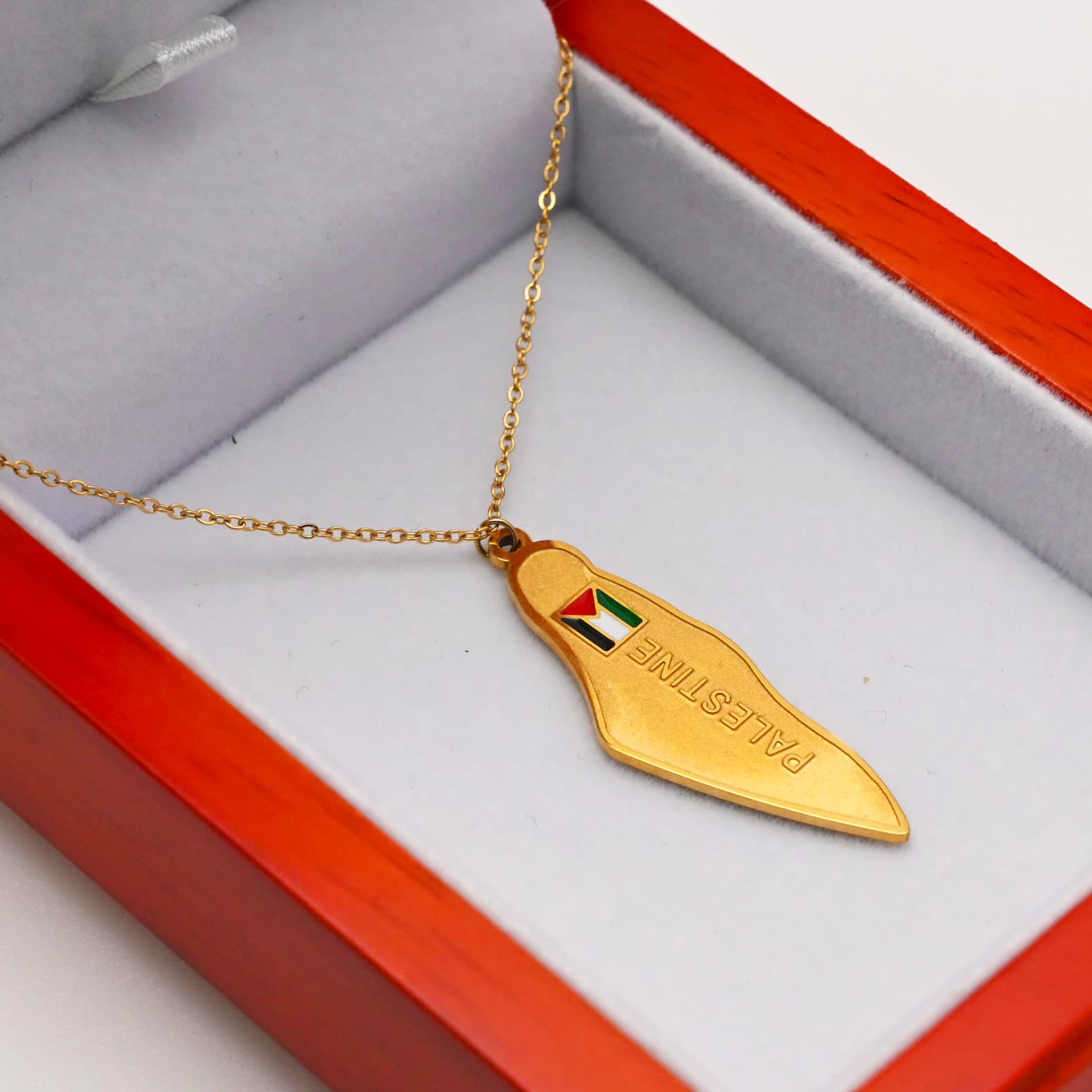 Gold Palestine map pendant necklace close-up in red gift box - CIGAONI