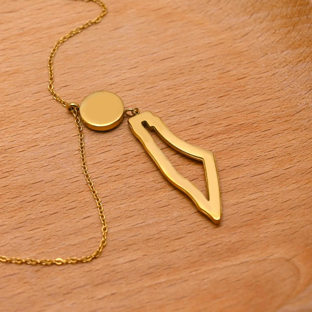 Eternal Guardian Necklace gold arrow outline pendant necklace on warm background - CIGAONI