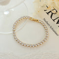 CIGAONI Pure Brilliance | Classic Square-Set Tennis Bracelet Stack - Clear Faceted Stones in Gold-Toned Setting - Layered Luxury Wristwear for Her