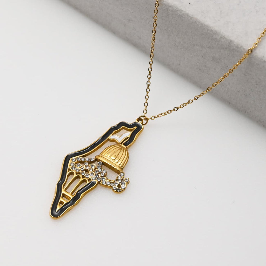 Gold Palestine map pendant necklace on warm toned background - CIGAONI